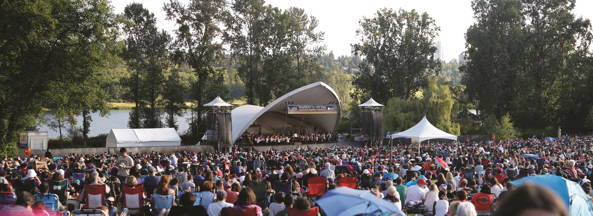 Panorama of the VSO tent and concert goers at the Symphony in the Park