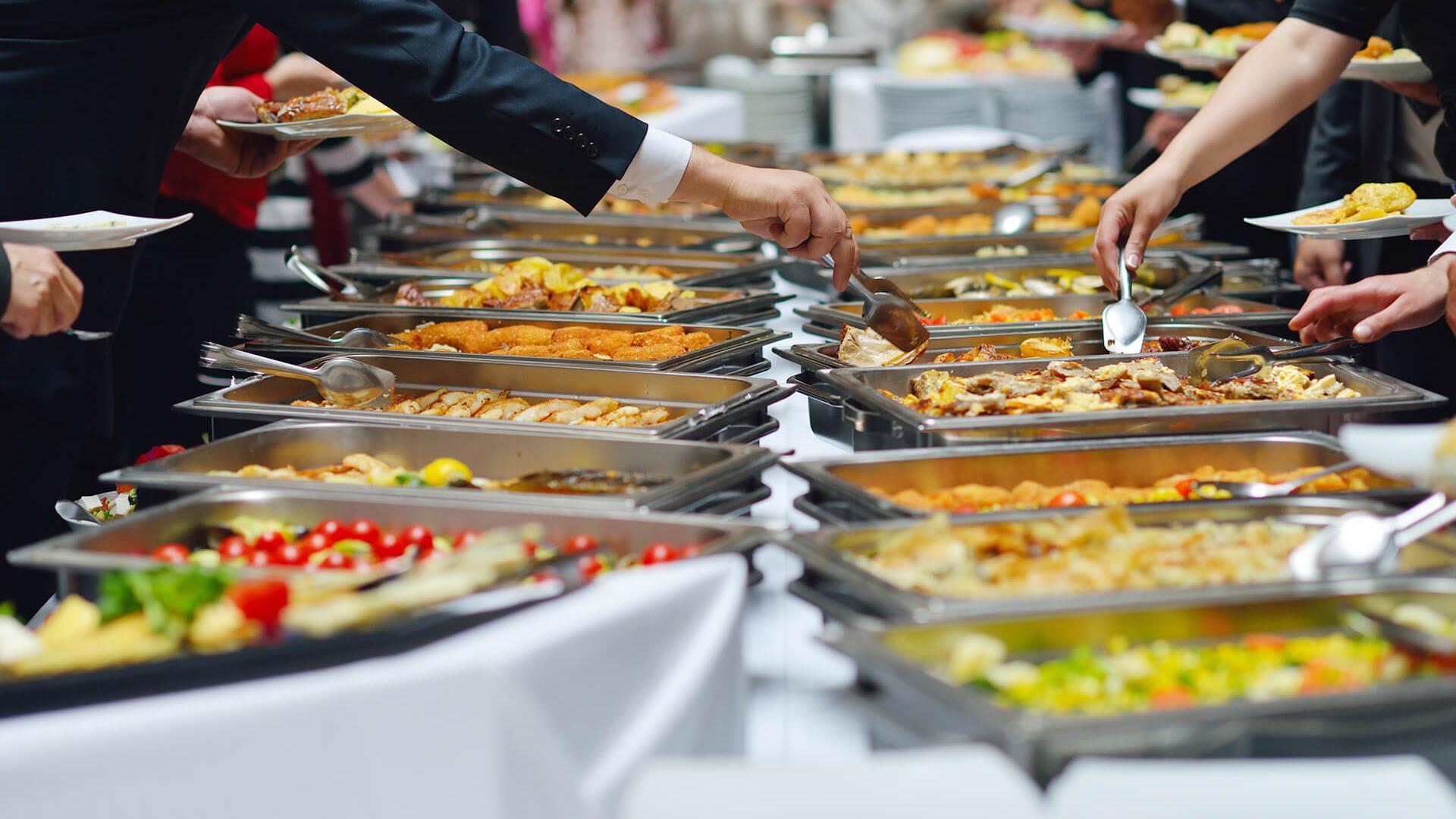 Buffet table set up with delicious food.
