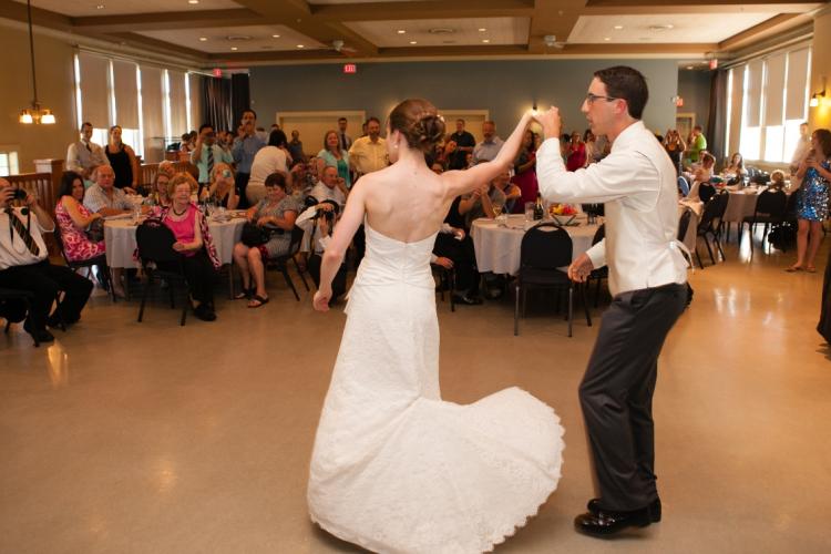 A bride and groom dancing at the Alan Emmott Centre