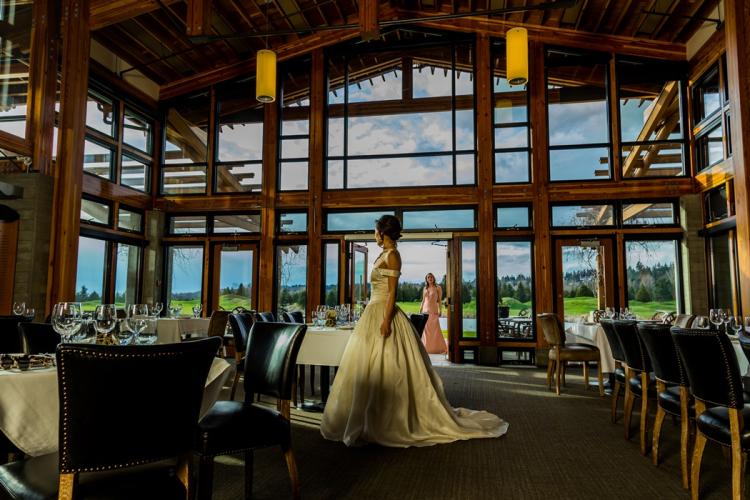 Photograph of a bride and bridesmaid in the Riverway Clubhouse