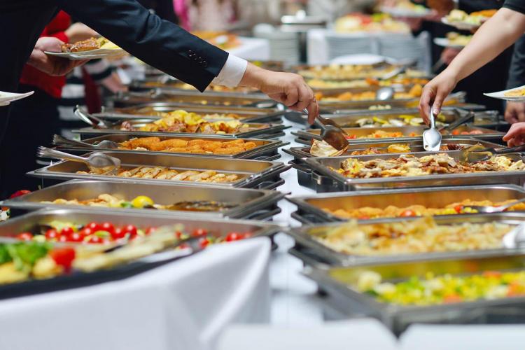 Buffet table set up with delicious food.